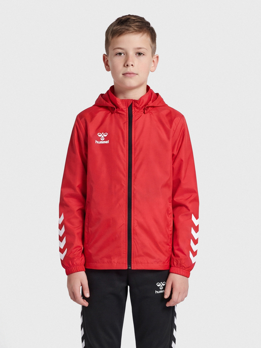 hmlCORE XK SPRAY JACKET KIDS, TRUE RED, model