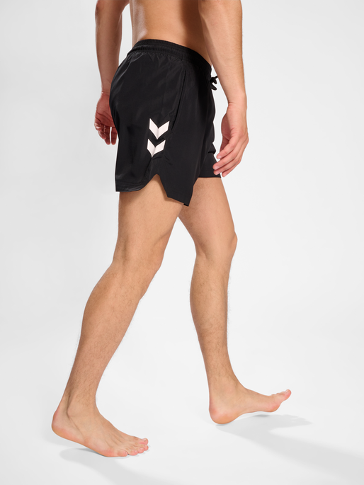 hmlLGC NED SWIM SHORTS, BLACK, model