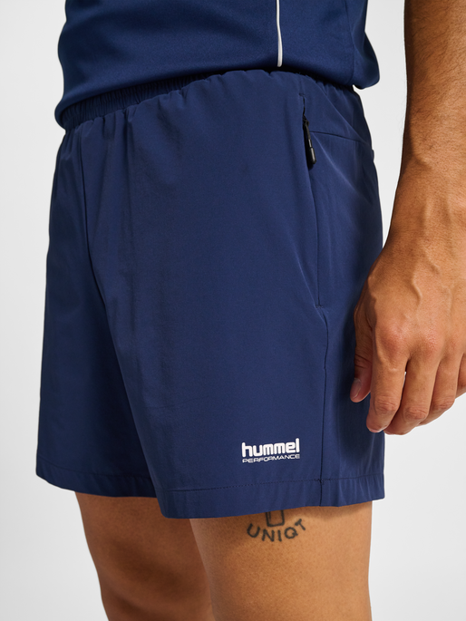 hmlPULSE SHORTS, DRESS BLUES, model