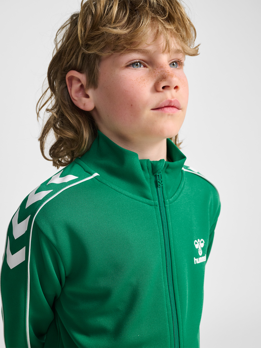 hmlTRACK TRACKSUIT, PEPPER GREEN, model