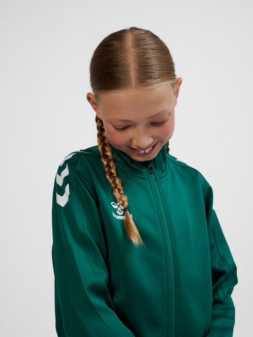 hmlCORE XK POLY ZIP SWEAT KIDS, EVERGREEN, model