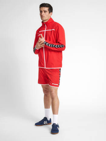 hmlAUTHENTIC TRAINING JACKET, TRUE RED, model