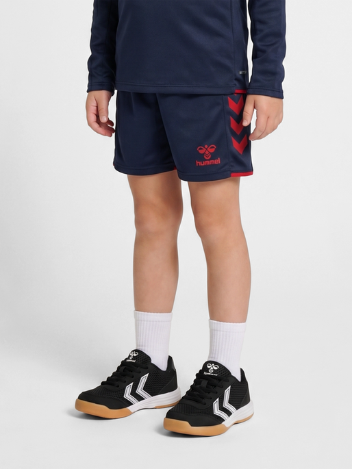 hmlCORE 2.0 SHORTS KIDS, MARINE/TRUE RED, model