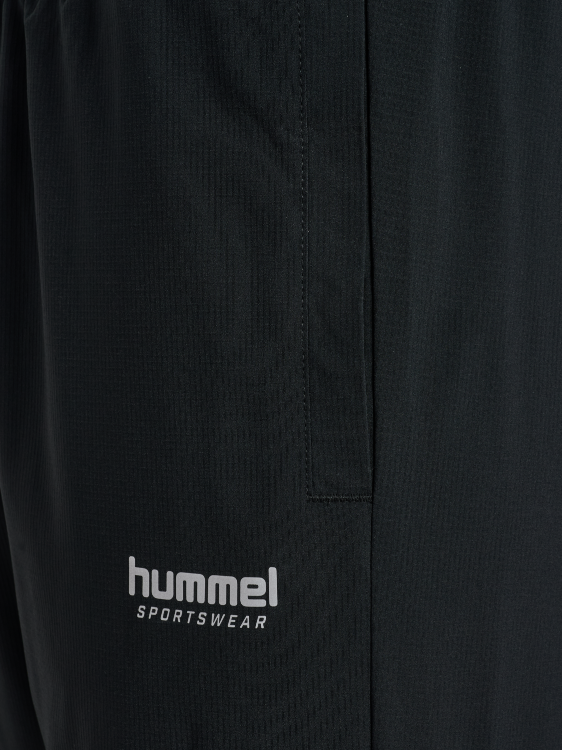 hmlLOOSE TRACK PANTS SPORTSWEAR, BLACK, packshot