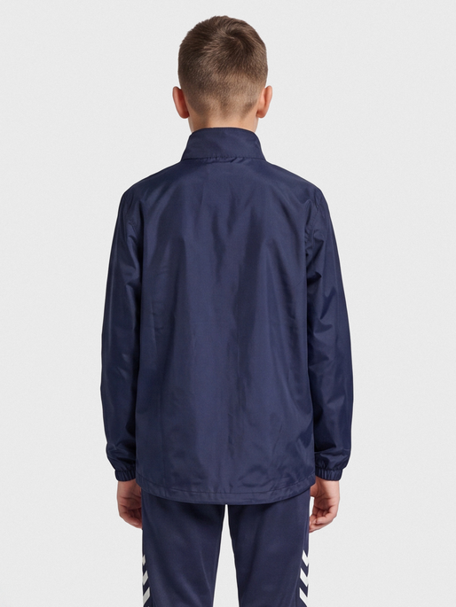 hmlPROMO RAIN JACKET KIDS, MARINE, model