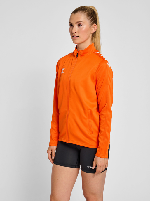 hmlCORE XK POLY ZIP SWEAT WOMAN, ORANGE TIGER, model