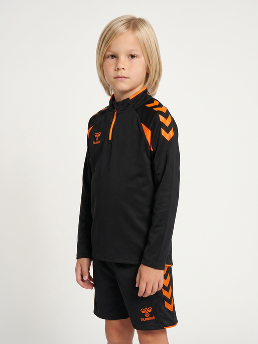 hmlCORE 2.0 HALF ZIP KIDS, BLACK/ORANGE TIGER, model