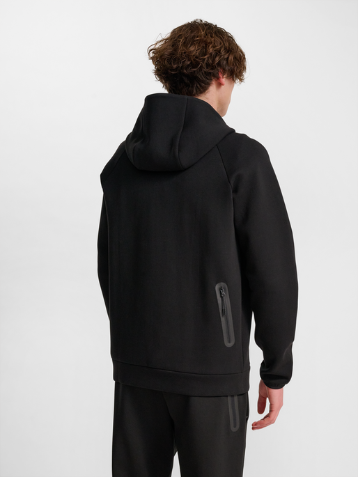 hmlTECH FLEECE REGULAR ZIP HOODIE, BLACK, model