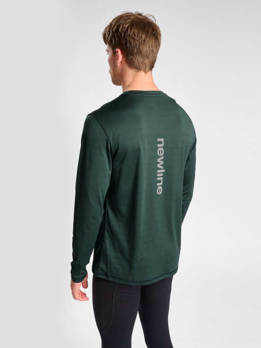 nwlBEAT POLY LS TEE, DARKEST SPRUCE, model